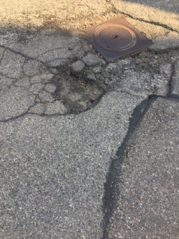 buca nell'asfalto