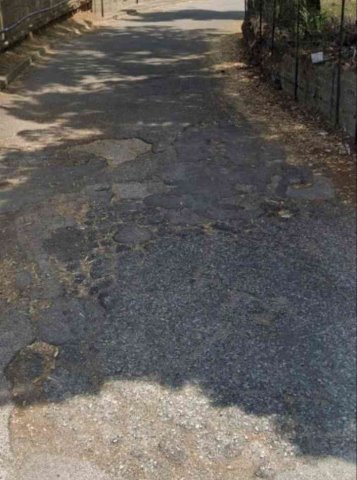 Strada da riparare